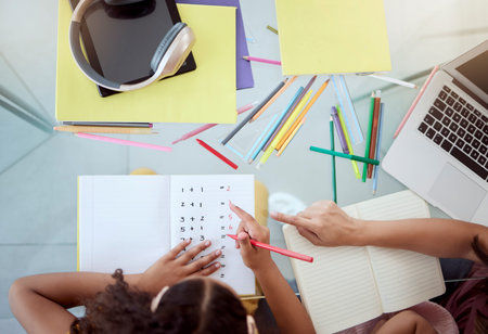 Home school, kid and mother writing math homework of numbers, education and studying for growth,...