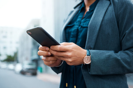 Hands, phone, business woman writing email or type on social media and reading online news. Read...
