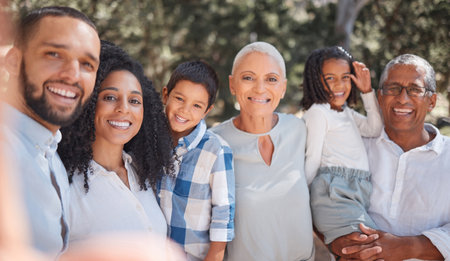Family portrait, selfie or children bonding in nature park, garden or Morocco picnic location in trust, love or security. Smile, happy or kids with mom, dad or grandparents in social media photographの写真素材