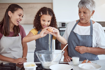 Happy family, child and grandmother cooking in kitchen with flour and egg food learning to make a...