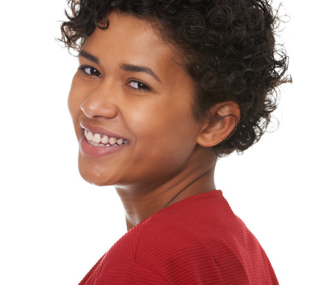 Sincere smiles cost nothing. Portrait of a gorgeous young woman smiling.の写真素材