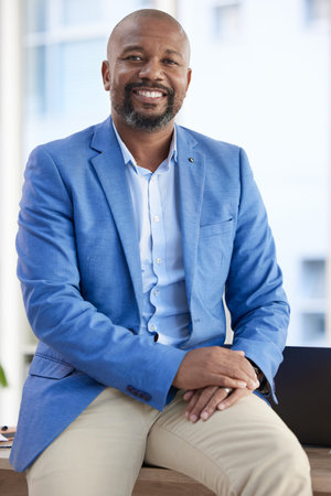 Black man, entrepreneur and businessman success in a office with proud company vision. Startup boss,...