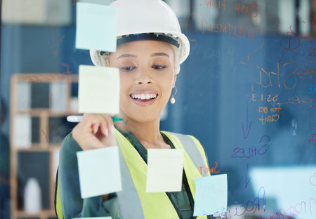 Building engineer, construction worker or sticky notes writing for engineering woman with smile,...