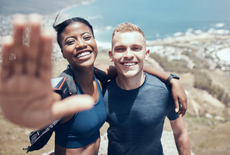 Interracial couple, selfie or hiking on mountains in nature environment, Monaco landscape or remote countryside hills. Portrait, happy smile or black woman with fitness man in social media photographの写真素材