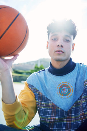 Man, portrait and basketball on sports court ready for training game, competition or match....