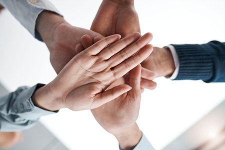 Teamwork, hands and collaboration in business people working together in the office. Diversity,...
