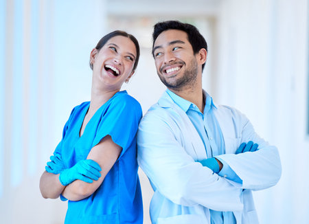 Together we make a great team. a young dentist with his assistant.の写真素材