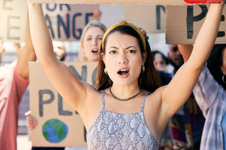 We only have one planet. Cropped portrait of a group of young people protesting in the city.