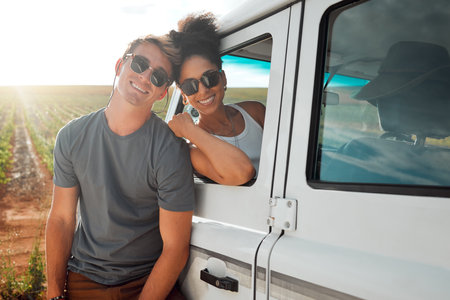 Couple, sunglasses and road trip in nature portrait, vacation or summer holiday outdoors. Love, diversity and man and woman spending time together on romantic journey or adventure in countryside carの写真素材