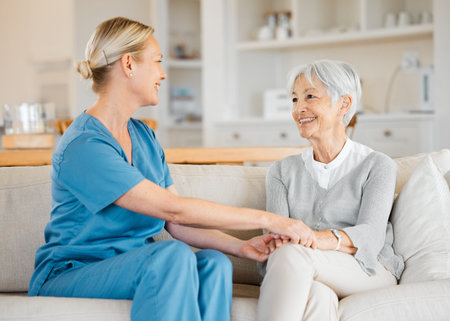 They get so deep into their chats with each other. a nurse caring for a senior woman at home.