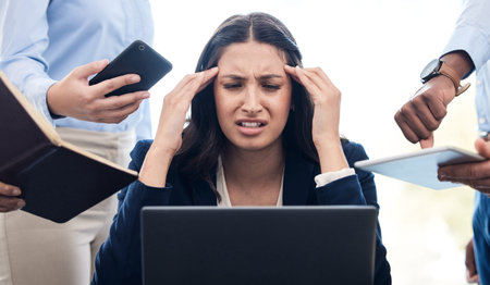 By failing to prepare, you are preparing to fail. a young businesswoman feeling stressed out in a demanding office environment at work.の写真素材