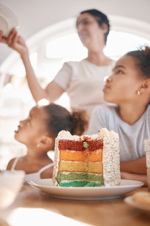 My life is better with every year of living it. a family preparing to eat a cake at a birthday party at home.の写真素材