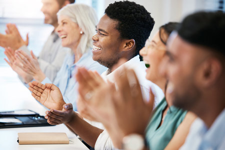 I am excited to implement what I learnt today. a young businessman applauding with his colleagues...