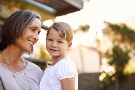 Grandchildren are compensation for getting old. Shot of a grandmother holding her adorable...