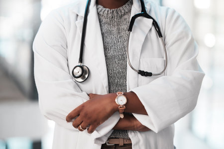 What seems to be the problem. an unrecognisable doctor working in a modern hospital.の写真素材