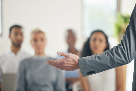 There will never be another like you. a group of business people watching a presentation.