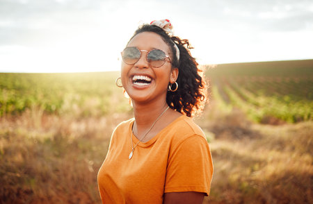 Happy, farm and black woman on holiday in the countryside of Colombia for adventure, peace and calm in summer. Face portrait of African girl with smile for travel vacation in agriculture and natureの写真素材