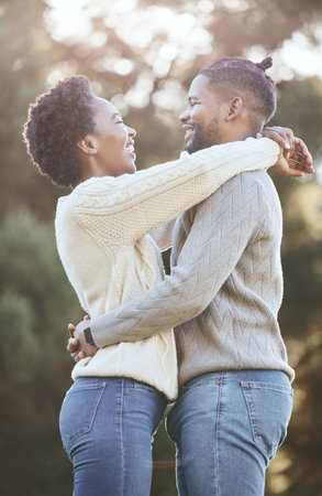 You make my soul smile. a young man hugging his wife doing a camping trip.の写真素材