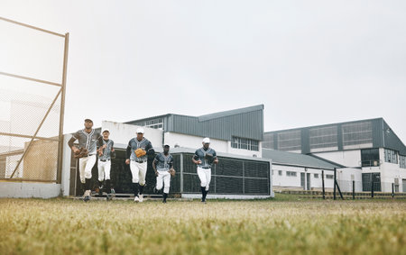 Sports, field and baseball player team running on a stadium field, ready for competitive game. Fitness, energy and athletic men at baseball field for exercise, health and training workout matchの販売画像