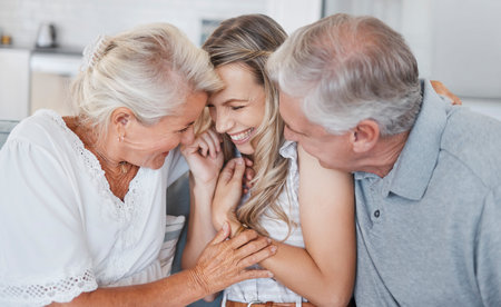 Family, senior parents and adult daughter or woman at home during visit with her mother and father...