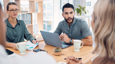 Meeting, teamwork and diversity, creative startup workers with laptop and performance or productivity report. CEO man and team listening to woman pitch strategy on business project proposal in officeの写真素材