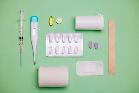 Everything you need to stay healthy. medical equipment against a green background.の写真素材