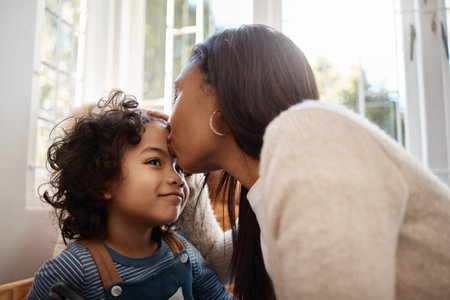 If he is not kind, Ive failed at everything. a young woman spending quality time with her adorable child at home.の写真素材