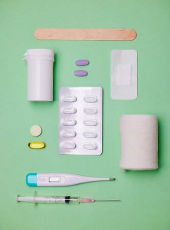 What do you need for your first-aid kit. medical equipment against a green background.の写真素材