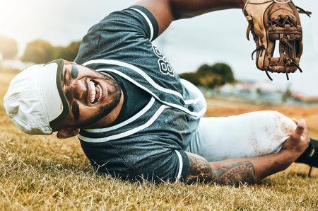 Baseball player, sports injury and knee pain with athlete man on grass pitch for leg osteoporosis and fibromyalgia. Health, injured and male with orthopedic or arthritis problem at sport matchの写真素材