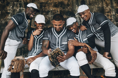 Baseball, sport and phone with a team of men on a bench after training, practice or a game....