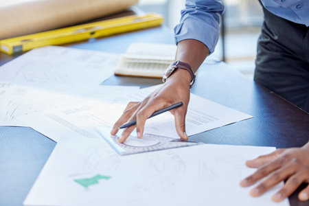 You cant trust him to deliver excellence from every angle. an architect working on paperwork at his...