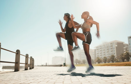 City fitness, woman or man jumping in cardio exercise, workout or training for hearth health, speed...