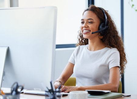 Im so glad we could help you. a young businesswoman working in a call center.