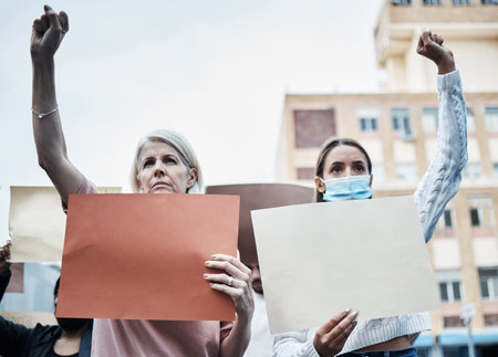 Fight for your future. a mature woman protesting the covid vaccine.