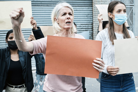 I will not be forced into this. a mature woman protesting the covid vaccine.の写真素材