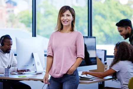 Committed to reaching great success. Portrait of a mature businesswoman standing in an office with...