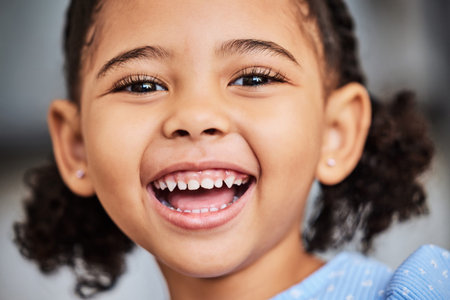 Girl, child and macro portrait with happy dental health smile on face in youth and childhood....