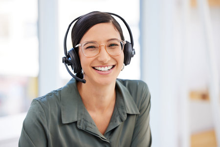 Always happy to help a customer. a businesswoman working in a call center.