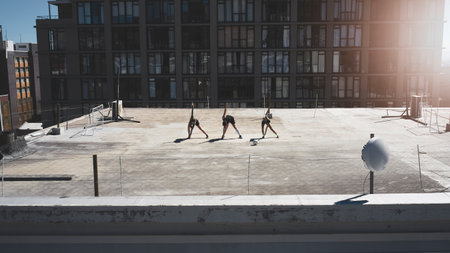 Team, soccer and stretching outdoor doing practice for game, tournament and training for play, health or fitness together. Teamwork, healthy group or cardio prepare soccer match, workout or exerciseの写真素材