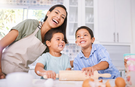 cooking, happy and mother with children in kitchen for food, family and learning with rolling pin. baking, help and creative with kids chef and mom at home for health, breakfast or love togetherの写真素材