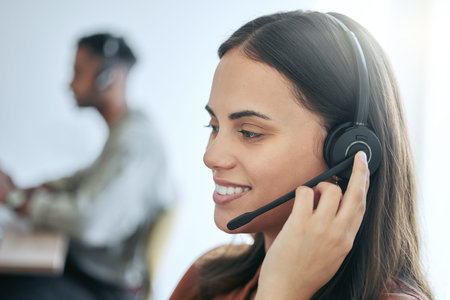 Always ready to help clients. an attractive young saleswoman sitting with a colleague in the office...