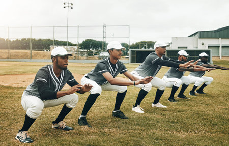 Sports, baseball and team stretching in training, exercise and fitness workout on a baseball field...