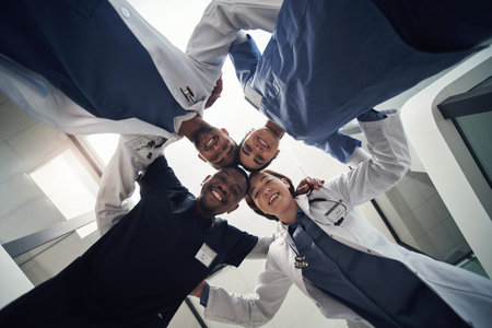 This is the dream team. a group of medical staff huddled together.