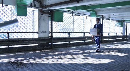 Leaving the office for the final time. Full length shot of a handsome young businessman looking...
