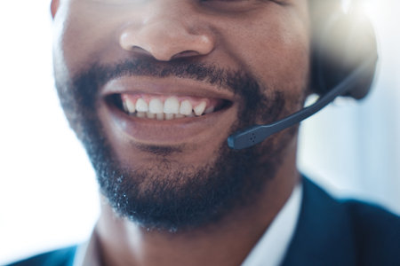 Black man, call center and phone call, smile with teeth and headphones contact us, communication and...