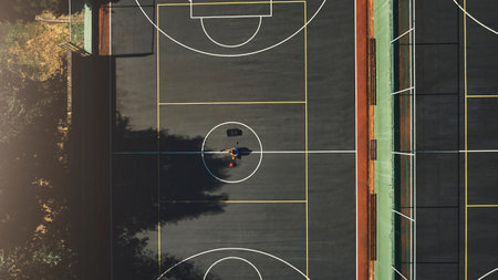 Basketball, sport and fitness, basketball court and game, public sports arena and exercise motivation top view. Athlete, workout and training, basketball player and competition with high angle.の写真素材