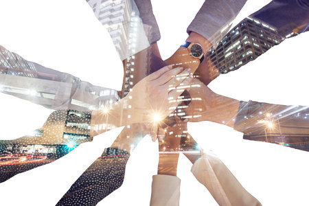 Corporate hands, business and support in double exposure of the city against white background. Hand...