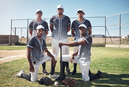 Young blood of baseball. Portrait of a group of confident young men playing a game of baseball.