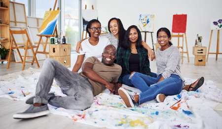 Arts and crafts keep you sane. a group of artists sitting together in a art studio.