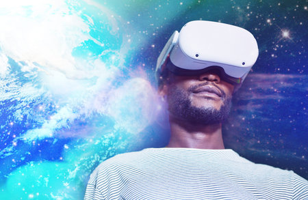 Virtual reality, futuristic and black man playing game in a galaxy metaverse with technology. Vr,...
